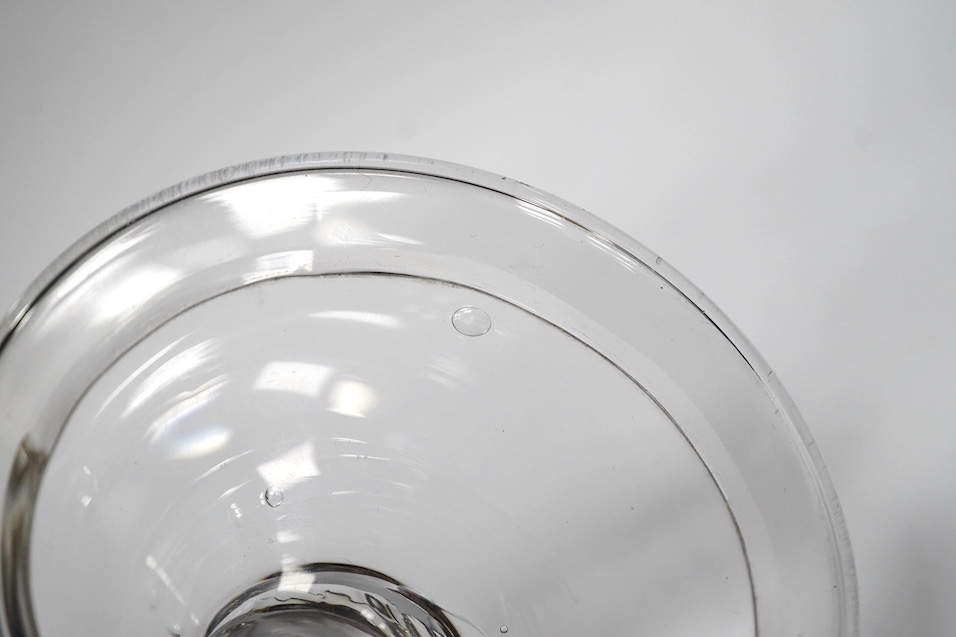 A heavy plain stem wine glass, circa 1740, bell shaped bowl, folded foot, 18cm high. Condition - good